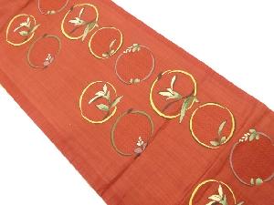 丸に花模様織り出し袋帯